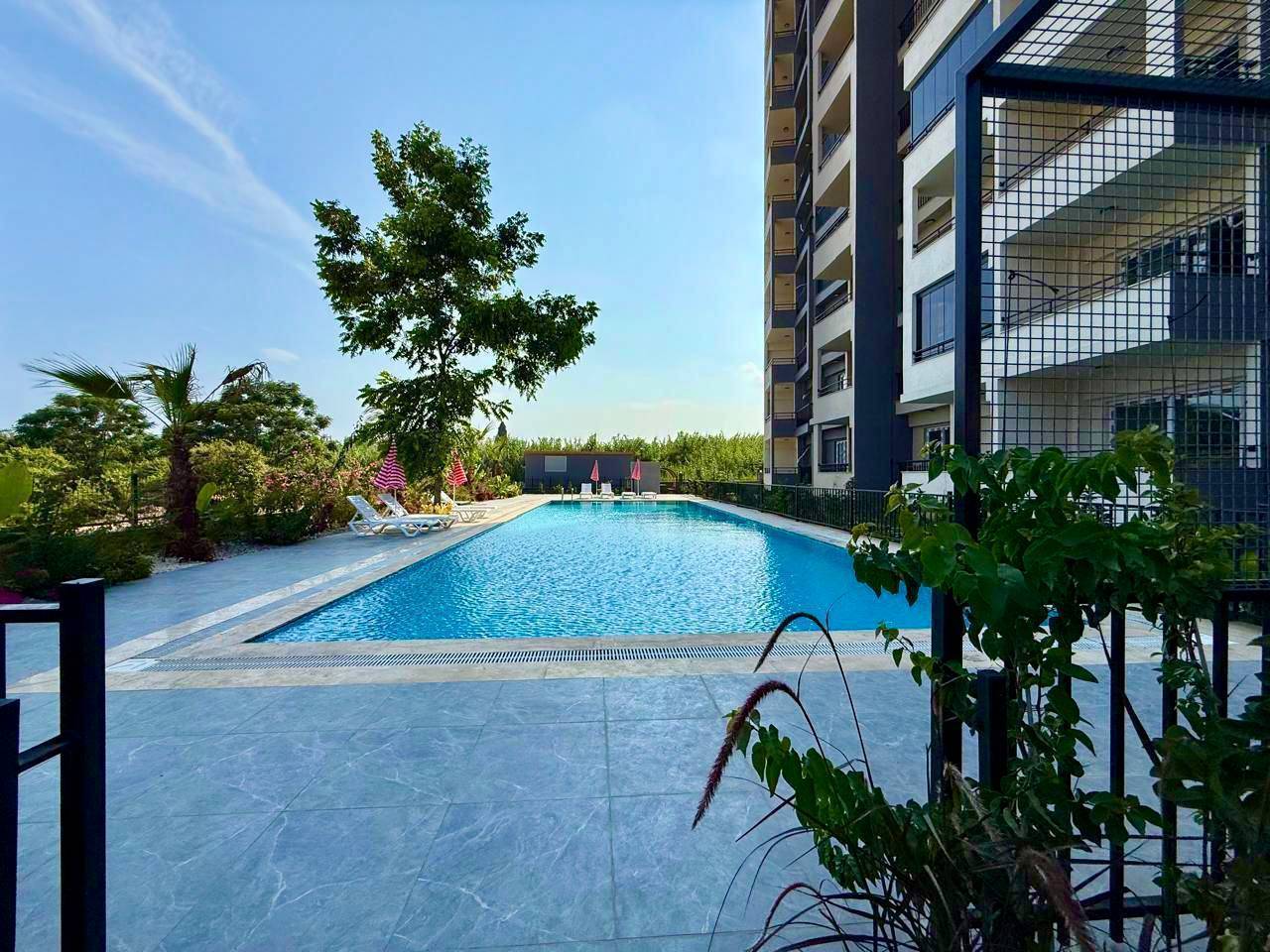 Mieten Sie eine Wohnung 1+0 in einem neuen Komplex am Meer in Kargıpınarı, Mersin - NAT-5-59